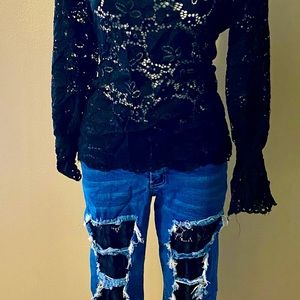 Great looking black lace blouse very nice for the holidays